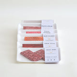 Packaged Meat Assortment — Wagyu, Salmon, Tuna & Beef Cuts Papercraft Joss Paper Offerings